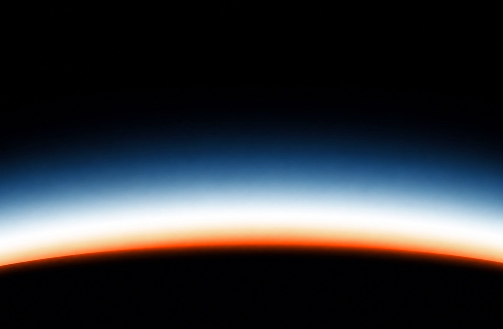 A glowing horizon against the dark sky